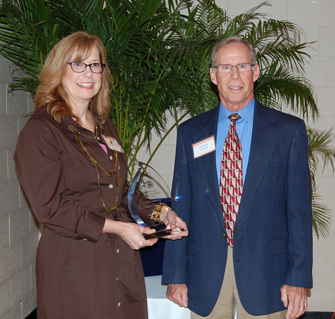 2014 H. Gordon Randall Outstanding Volunteer Kay Bransford with MCC Executive Director George Sachs.