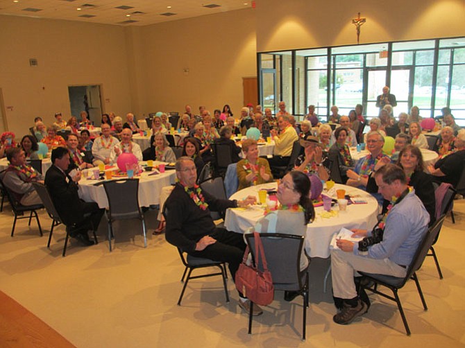 More than 100 guests, draped in leis, attended the volunteer appreciation luncheon hosted by Shepherd Center of Oakton-Vienna on April 7.