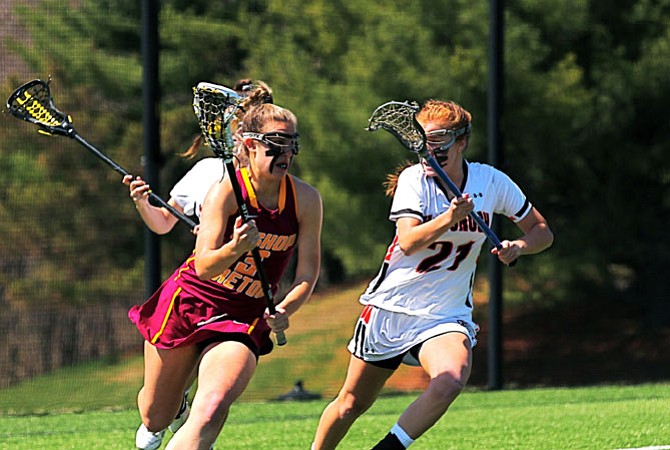 Kayla Duperrouzel and the Bishop Ireton girls’ lacrosse team lost to McDonogh on April 11.