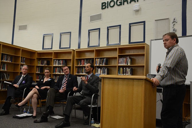 South County Federation president and Lorton resident Nick Firth (right) moderates a debate among Democratic candidates for Mount Vernon supervisor: (from left) Tim Sargeant, Candice Bennett, Jack Dobbyn and Dan Storck.