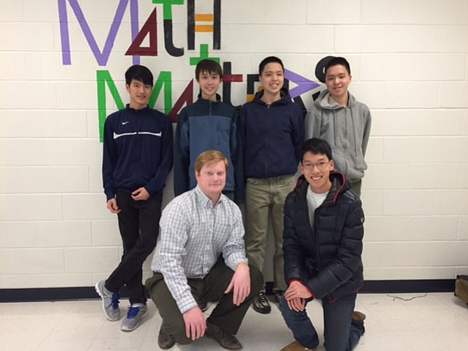 The team of South County High School juniors (top, from left) Trung Nguyen, Alex Coppeans, James Wang, Peter Wang and (front right) Brian King, along with their teacher and team sponsor Daniel Southard will travel to New York City to compete in the applied math contest Moody’s Mega Math Challenge.
