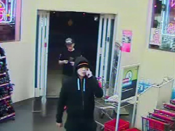 A surveillance photo shows one suspect from the armed robberies that occurred at two CVS stores on Easter Sunday.

