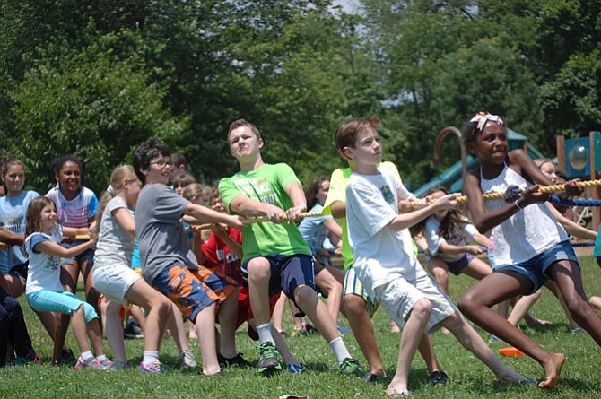 Summer camp experiences can help children become self-confident and self-reliant.