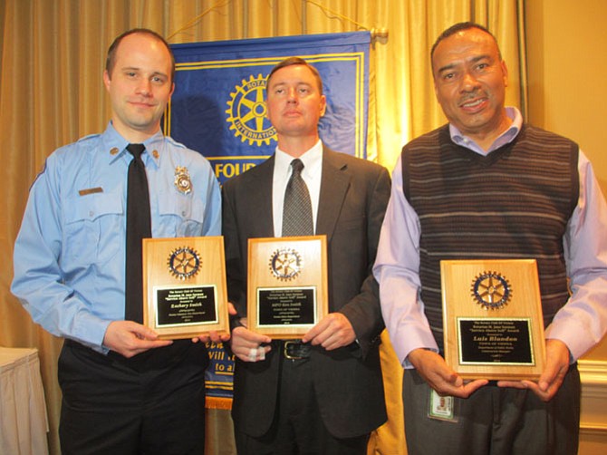 The Rotary Club of Vienna honored Firefighter/EMT Zach Smith, Master Police Officer Ken Smith, and Town of Vienna Public Works supervisor Luis Blandon with the 2014 M. Jane Seeman Service Above Self awards for outstanding contributions to their respective departments.
