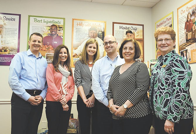 From left, Bob Farr, Wegmans Virginia division manager; Jennifer Stickles, Wegmans marketing; Heather Gole, Wegmans Virginia human resources division manager; Mike Dempsey, Alexandria Wegmans store manager; Jo Natale, Wegmans vice president of media relations and Linda Lovejoy, Wegmans community relations manager.  