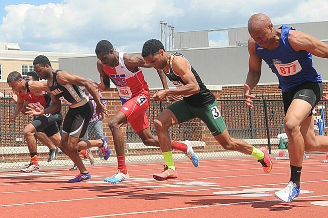 T.C. Williams junior Noah Lyles, third from right, won the 100-meter dash at the T.C. Williams Invitational on May 2.