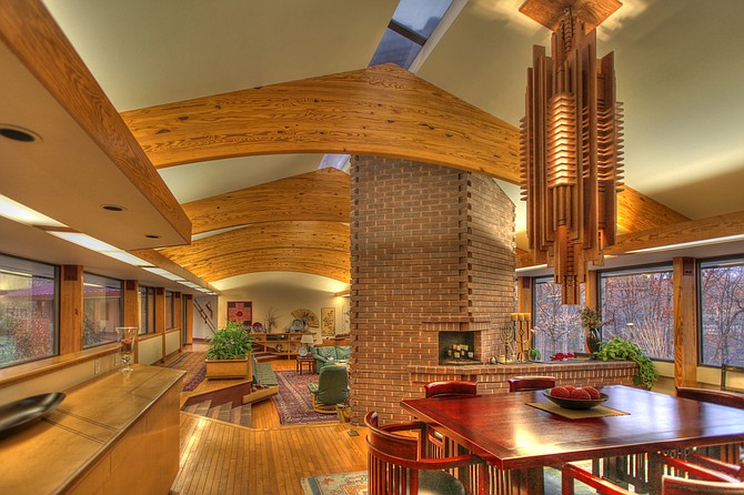 The Gottlieb home at 8625 Hampton Way, Fairfax Station, features a pair of waterfalls and maple and walnut furniture crafted by owner Mark. 