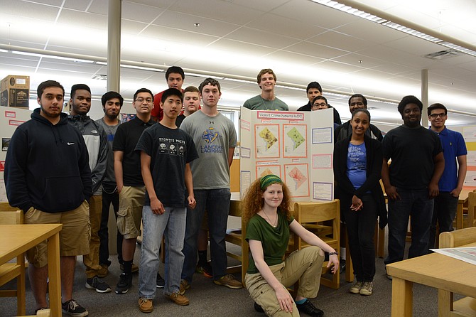 Robert E Lee High School seniors in Mary Schaefer’s Geospatial Analysis class, including (rear, from left) Hammad Chaudhry, Timothy Freeman, Hasan Ali, Sothea Sok, Enzo Rodriguez, Jia-Kang Ju, Brian D’Amore, Cameron Smith, Peter Block, James Zurta, Mirza Baig, Solomon Araya, Bilien Woldetatios, Samuel Amarteifio, Alexis Arriaza and (front) Sunny Cushing-Spiller presented mapping projects at the National Geospatial-Intelligence Agency in Springfield.