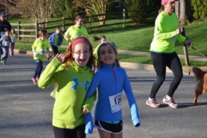 Riley Lynch and Mary Boniface on the course. More than 200 Wolftrap Elementary students participated in the event.