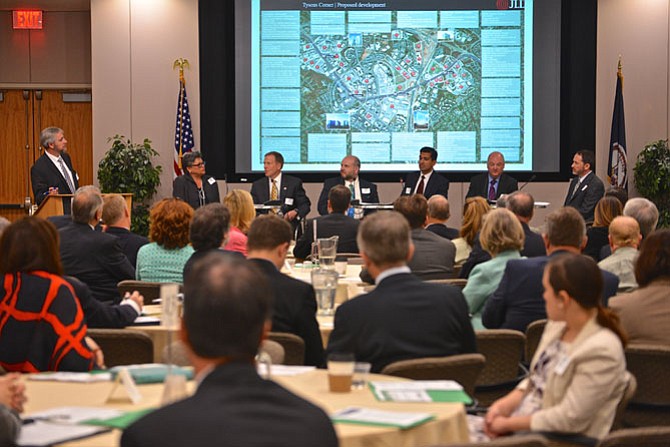 The Northern Virginia Transportation Commission Forum Speakers Panel: From left are moderator Robert Puentes, senior fellow and director, Metropolitan Infrastructure Initiative, Brookings Metropolitan Policy Program; Maggie Parker, director of communications and community outreach, Comstock Partners, LLC; Mark Carrier, senior officer of B.F. Saul Company Hospitality Group; Buddy Rizer, director for economic development in Loudoun County; Shyman Kannan, managing director of planning, Washington Metropolitan Area Transit Authority; Terry Clower, NoVa chair and professor of public policy at George Mason University, deputy director GMU Center for Regional Analysis; Brian Smith, assistant to the president and CEO for organizational advancement at Hampton Roads Transit. 
