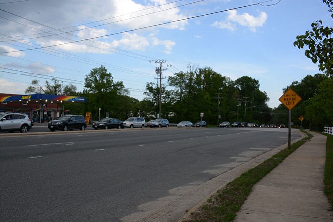 Cars heading northbound on two lanes of Rolling Road back up during a weekday evening rush hour.