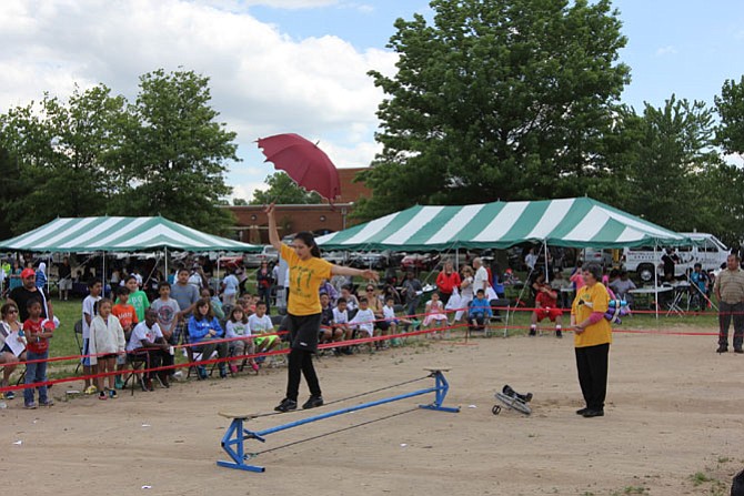 The Jim Moyer Circus Club performs at the 2014 Hope & Health Festival in Lorton.