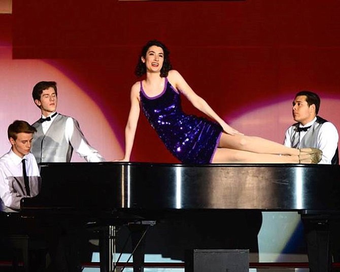 From left:  Brett Bowker, William Shipley, Catherine Ariale and Dominique Ramos in West Springfield High School’s production of ‘Merrily We Roll Along.