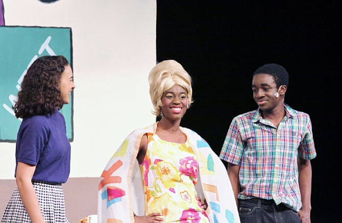 From left:  Sydney Crutcher, Amirah Kirwan and Nathan Nkomba in South Lakes High School's production of ‘Hairspray.’