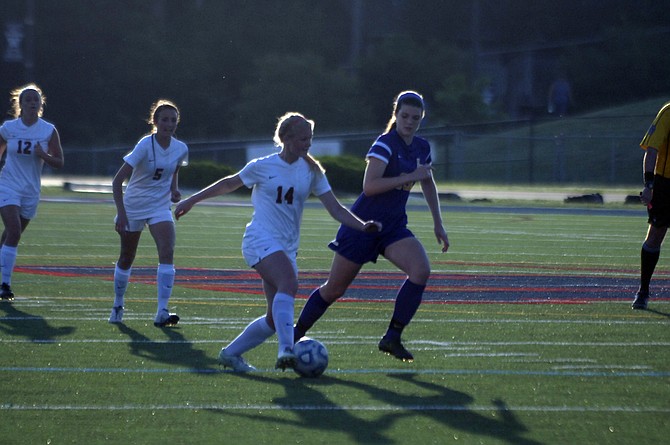 Woodson forward Natalie Stynchula (14) scored her team-leading 15th goal of the season on Tuesday during a 2-1 victory over Lake Braddock.