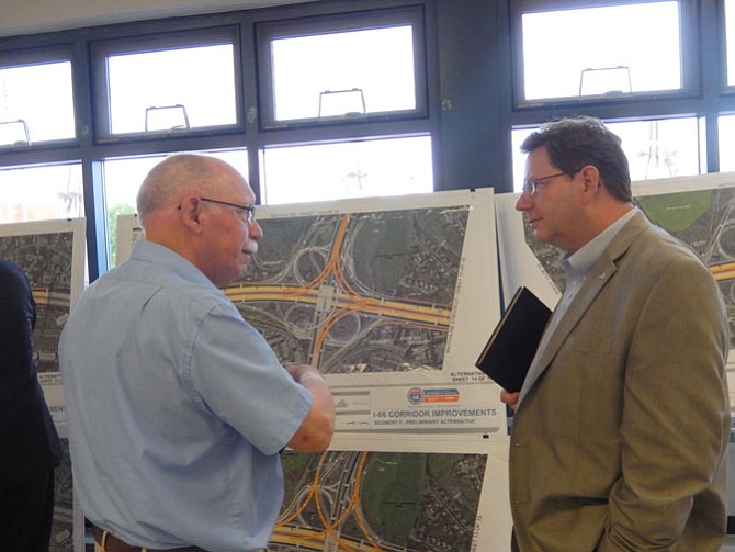 Jerry Foltz (left), of Centreville’s Country Club Manor community, and VDOT engineer Mitch Ball discuss the I-66/Route 28 project.
