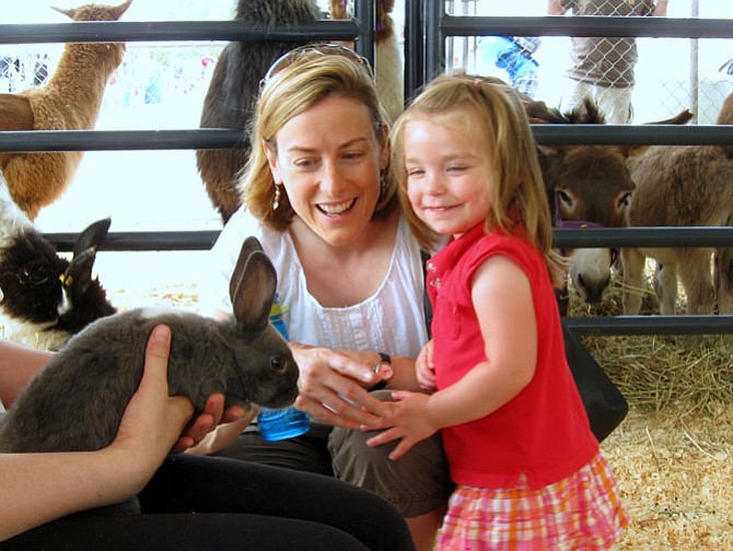 The Shupp Family enjoys their time in the Petting Zoo.
