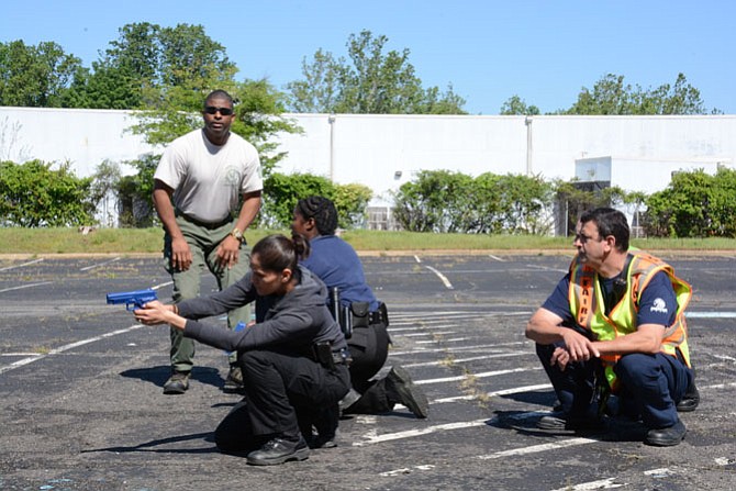 Fire and police personnel received training in “warm zone” scenarios involving a simulated active shooter  in joint training outside the former Washington Gas building in Springfield.