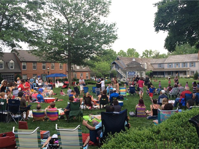 Large crowds gathered last Sunday on the Great Falls Village Centre Green to experience the first performance of the Concerts on the Green summer season. 
