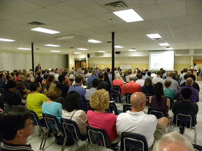 Citizens attend  a public meeting on the I-66 expansion on Thursday, May 28 in Oakton High School.
