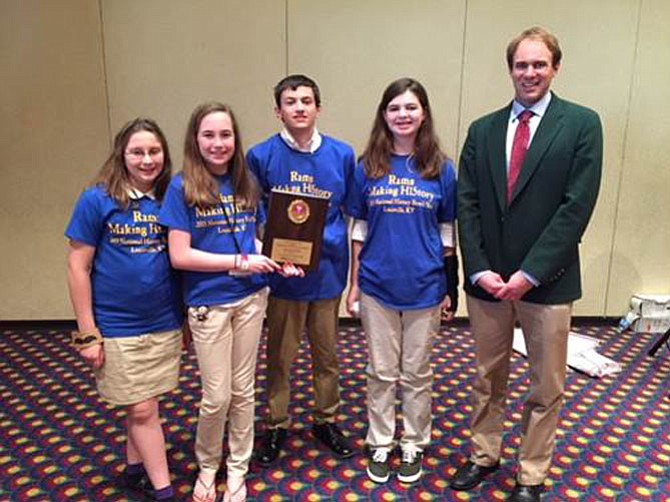 From left, Robinson Secondary School students Kate Augelli (seventh), Lily Britzinghoffer (seventh), Mason Cook (eighth) and Megan Sullivan (eighth), and their coach Michael P. Campana represented Robinson at the Middle School National Championship of the National History Bowl in Louisville, KY.
