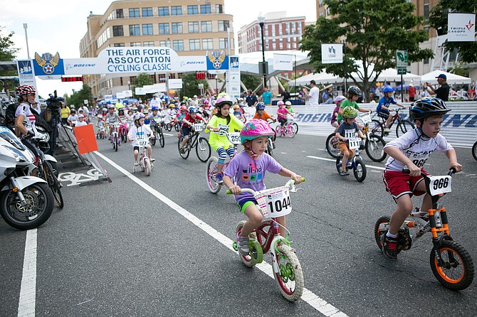 Children race in the 2014 Kids Bike Race dedicated to Ethan Kalancnik.