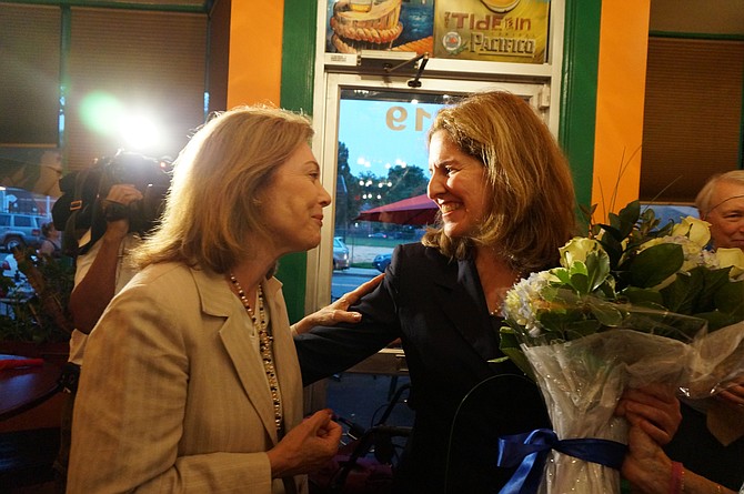 Vice Mayor Allison Silberberg, right, is congratulated by a supporter at Los Tios Restaurant following her victory in the June 9 Democratic primary. Silberberg defeated incumbent Mayor Bill Euille and former Mayor Kerry Donley in the race to determine the Democratic candidate for mayor in November’s election. At this time, she is running unopposed.
