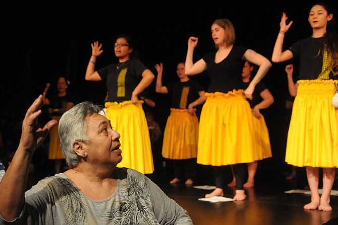Maori instructor Charlene Shelford-Lum directs the group in a Maori dance.