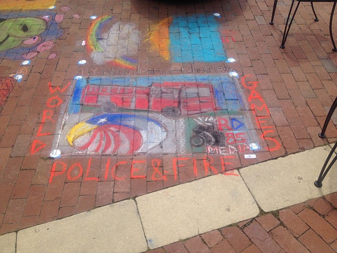 On June 13-14 Reston Lake Anne Plaza hosted its 2nd annual Lake Anne Chalk on the Water Festival. There were three categories to participate in, each with cash and other prizes awarded. More than 100 chalk artists participated in this event.
