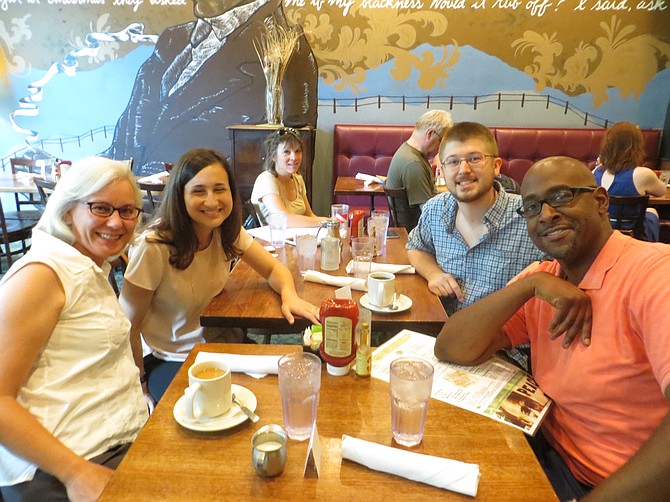 Democratic County Board candidates Katie Cristol (left center) and Christian Dorsey (right) with School Board member Barbara Kanninen (left) and local Democrat Ian Redman.