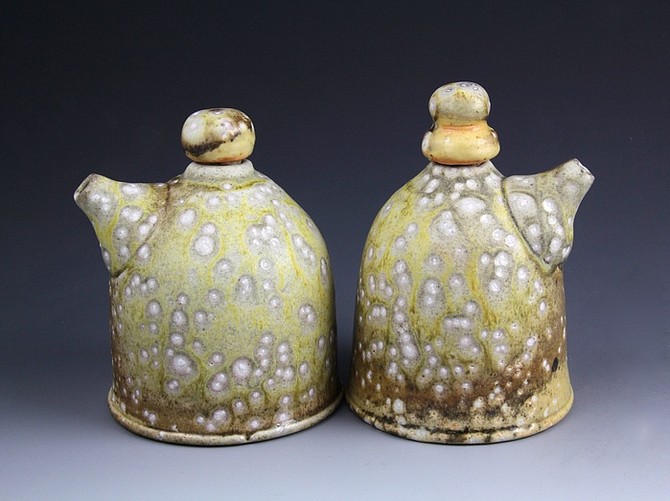 Soda-fired oil and vinegar cruets by Carolanne Currier from Huntingdon, Pa. The “Tabletop” exhibit at The Art League features work crafted by ceramic artists from all over North America. Guests will find functional art objects including plates, bowls, and more, through July 6. Admission to the gallery is free. Visit www.theartleague.org. 
