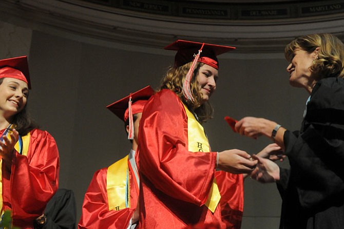 Anna Quinn Campion is presented with a faculty award by Dr. Ellen Reilly.