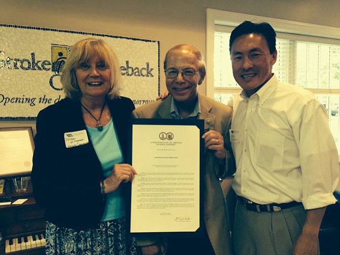 Founder and Executive Director, Stroke Comeback Center, Darlene Williamson, long-time Center member and goodwill ambassador Paul Berger, and Resolution sponsor Del. Mark Keam (D-35) show off House Resolution HJ668 to guests at the Center’s 10th anniversary celebration.
