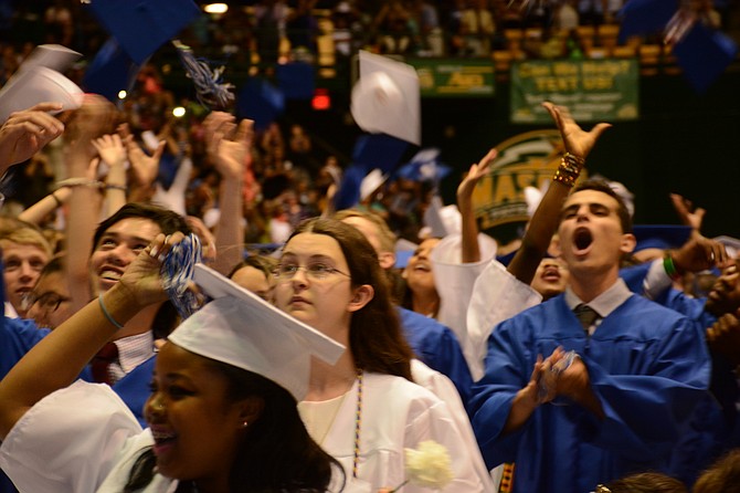 West Potomac seniors celebrate after being proclaimed graduates in the June 18 ceremony.