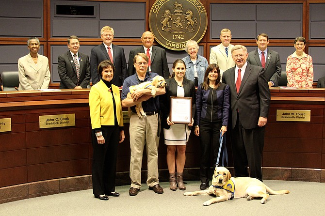 The Fairfax County Board of Supervisors recognized Jacqueline Cheshire for her years of dedication as a volunteer to Canine Companions for Independence. Cheshire was awarded the Governor's Volunteerism and Community Service Award for her work.