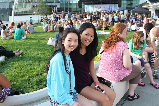 From left -- Emma and Hannah Grossman of Vienna wait for the show to begin.
