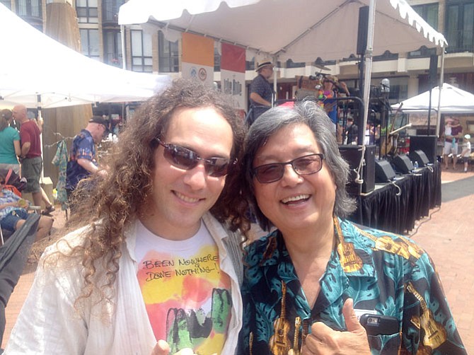 Musician Stuart Fuchs with Oak Hill resident and musician Glen Hirabayashi of the Aloha Boys. Both played at the Saturday, July 11 annual Ukulele Festival in Reston.The festival was hosted by the Lake Anne Merchants with support from the Reston Community Center, Friends of Lake Anne (FOLA), and the Northern Virginia Ukulele Ensemble.