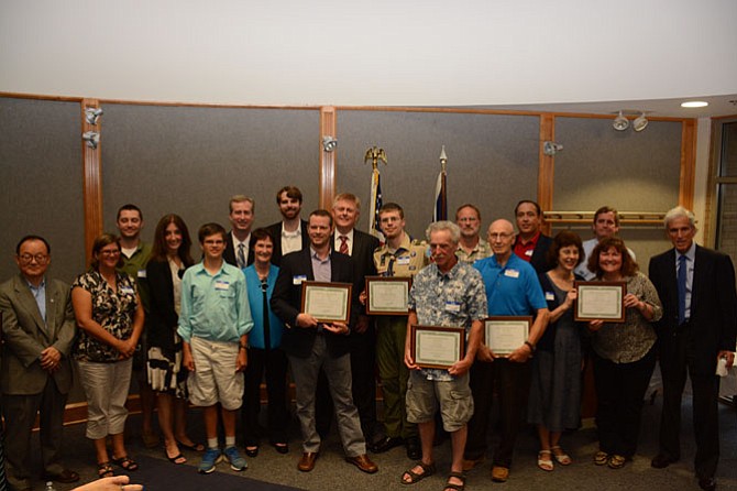 Winners of the 2015 Best Of Braddock Awards stand at the front of the Braddock District government office with local elected officials on July 8.