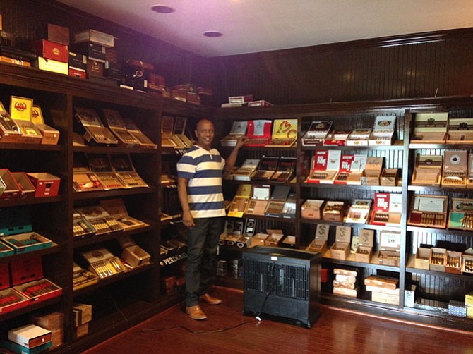 Cigar & More owner Lemma A. Lemma comes from a tobacco background in his native Ethiopia. He opened his first cigar shop in Atlanta in 1999. His walk-in humidor holds hundreds of cigar varieties.
