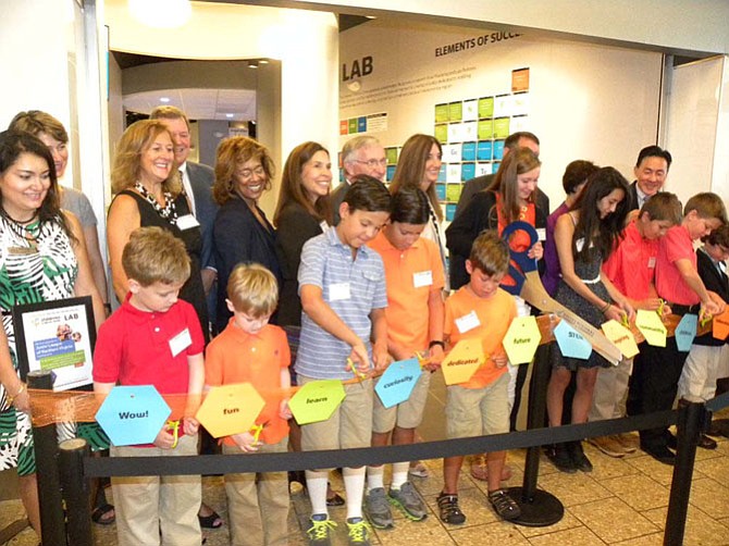 Youth ambassadors officially open the Children’s Science Center Lab at Fair Oaks Mall on Monday, July 20.
