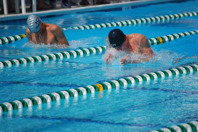 Ryan Windus (Right) swims the 15-18 boys 50 meter breaststroke on Sunday. Windus won the race by over five seconds.
