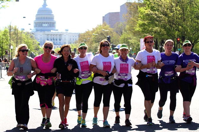 The LOL team in training crosses the finish line at the Nike Women’s Half Marathon in Washington, D.C. McLean residents (from left) Chris Fraley, Mary Ellen Overend, Barbara Overstreet, Dorothy McAuliffe (McLean and Richmond. First Lady of Virginia), Lynne O’Brien, Beth O'Shea, Lauren O'Brien (Denver Colo.), Kim Aubuchon and Terry Lineberger.  
