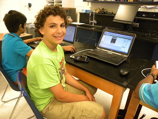 Lake Braddock Middle School student Jacob Parker perfects his cat-and-mouse game app inspired by Tom and Jerry cartoons at the summer Middle School Tech Institute by Thomas Jefferson High School for Science and Technology.
