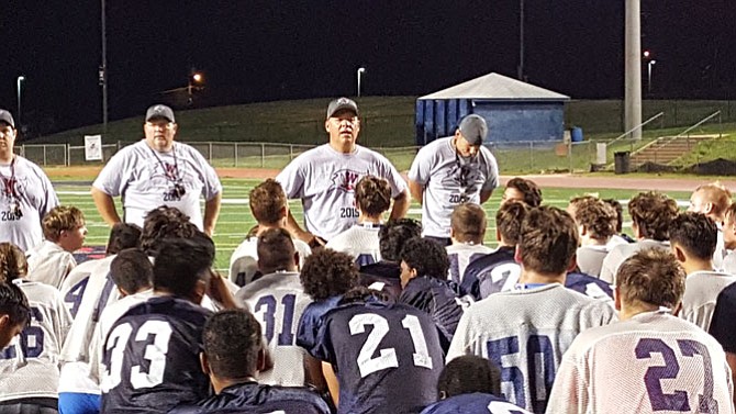 Second-year Woodson head football coach Mike Dougherty is trying to instill toughness in a program that finished 2-8 last season.