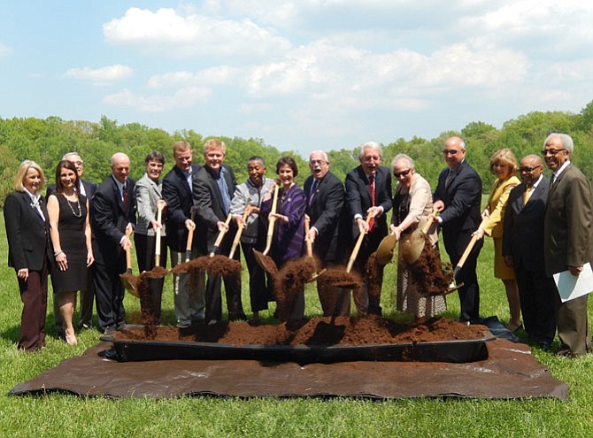 Dignitaries and stakeholders officially break ground for Residences at the Government Center. 
