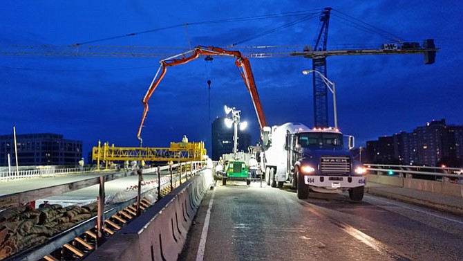 In the overnight hours, crews pour the deck for the Seminary Road bridge over I-395.
