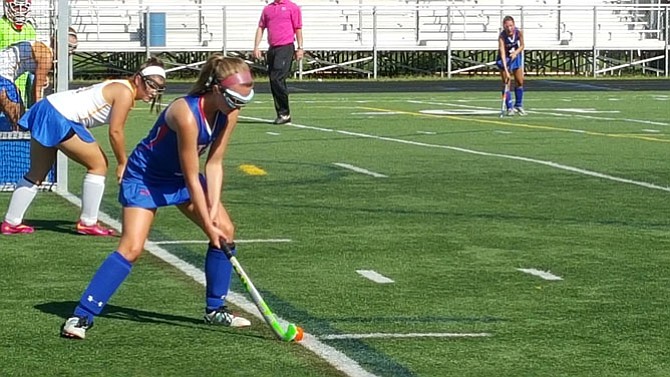 T.C. Williams rising senior Alex Milliken prepares to insert a penalty corner during the Under the Lights tournament on Aug. 25 at Lee High School.