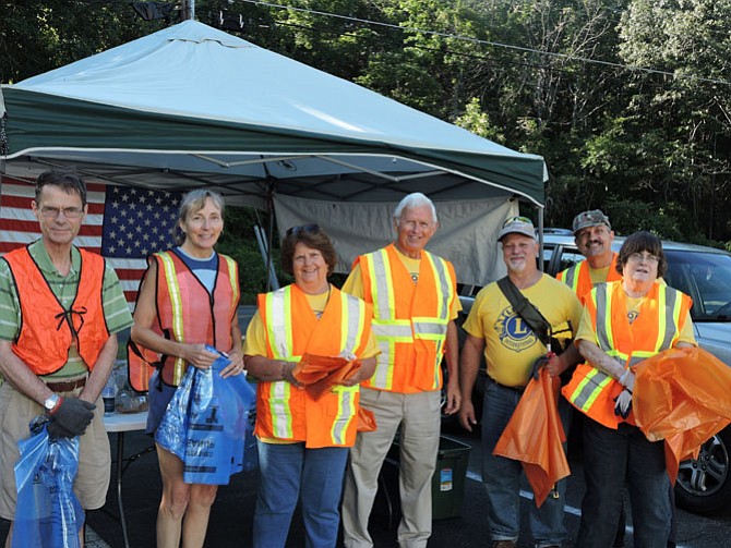 From left, Dan Fransell, Helen Fransell, Reba Morse, Foster Morse, Paul Tompkins and Kris Tompkins were among volunteers who helped collect litter from Old Colchester Road.