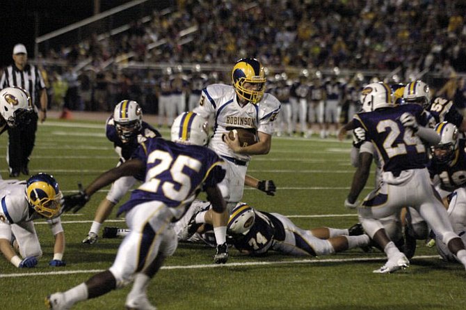 Roman Lowery, seen during the 2014 season, is one of three Robinson starting running backs whose listed weight is at least 200 pounds.