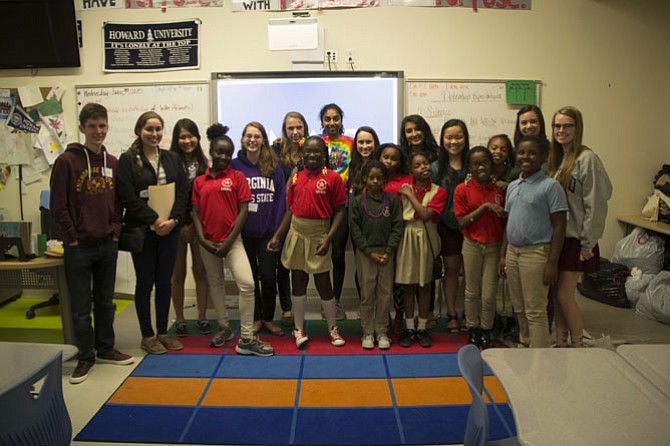 McLean High School students visiting Stanton Elementary in D.C. last year.
